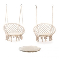 Fauteuil suspendu de jardin moderne en macramé de coton fait main avec pompons pour l'ameublement extérieur