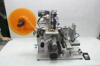 Machine d'impression semi-automatique, pour bouteilles plates