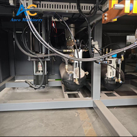 Machine de soufflage de bouteilles PET automatique à soufflage par étirage, type servo complet, avec PLC Mitsubishi et cylindre rotatif essentiel