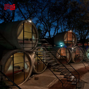 Los tubos de cemento transformados en cabañas independientes son experiencias únicas instalaciones de alojamiento de arte público - Product Image 2