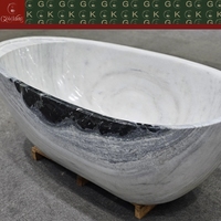 Baignoire ovale autoportante en marbre blanc Panda GOLDKING, design contemporain, veinure noire audacieuse, polissage CNC OEM, sur mesure