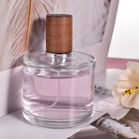 Botol semprotan parfum kaca silinder, semprotan botol parfum kaca bulat kosong 30ml 50ml 100ml dengan tutup hitam