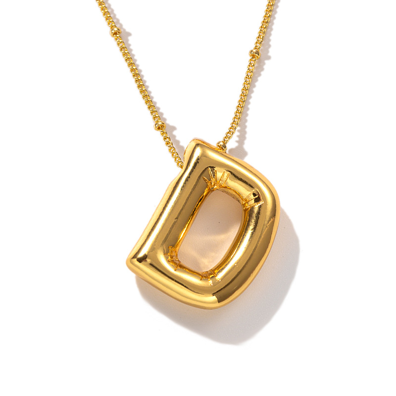 Gold D necklace