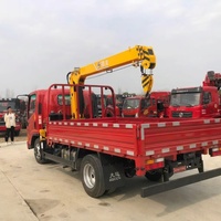 Grue montée sur camion de 10 tonnes pour la construction de ponts routiers, le transport d'équipements et le levage sur site