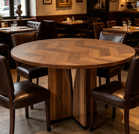 Table à manger ronde en parquet de noyer de style nordique avec base en bois massif et chaises en cuir blanc, meubles de salle à manger pour villa