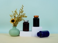 Contacter L'ANIMAL FAMILIER coloré personnalisable met la bouteille en bouteille pharmaceutique de bouteille de capsule avec des couvercles pour votre