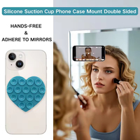 Support de téléphone en silicone à ventouse en forme de cœur pour grille d'aération de voiture
