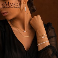 EMANCO Ensemble d'accessoires empilables en acier inoxydable style minimaliste avec accent perle, colliers chaîne cubaine, bracelets et boucles d'oreilles pendantes