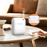 Diffuseur de parfum automatique portable électrique de luxe SCENTA, diffuseur d'huiles essentielles d'aromathérapie sans eau USB en gros