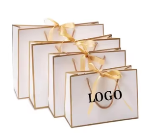 Empaque de Regalo de Papel Artístico Reciclable de Lujo, Ecológico y Hecho a Mano, con Asas de Cinta Troqueladas Personalizadas para Ropa, Venta al Por Mayor - Product Image 4