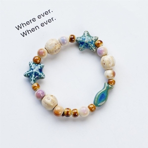 Bracelet extensible en céramique perlée, style nautique côtier, avec breloque étoile de mer et coquillage naturel faits à la main, souvenir touristique bohème de bord de mer, vente en gros - Product Image 5