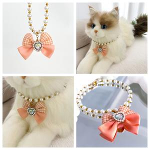 2025 Nueva gran oferta elegante de lujo de doble capa perla pajarita patrón militar mascota gato perro Collar accesorios personalizados para Ins - Product Image 1