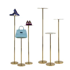 Set of Three Golden luxury display riser counter display showcase for shoe and bag store