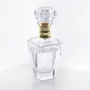 Flacon pompe à pression en verre 60ml, marque de luxe, forme d'anatomie, pour parfum, avec capuchon en cristal et pompe en or