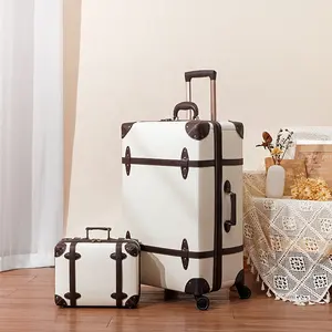 出厂价格20英寸白色中号复古行李箱拉杆箱行李袋pu皮革带4轮手动复古旅行行李箱