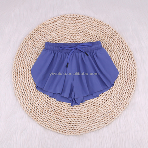 Vente en gros mode 2 en 1 jupe de yoga pour enfants 2023 nouvelle jupe de tennis pour enfants shorts de sport solides personnalisés pour filles avec poches - Product Image 2