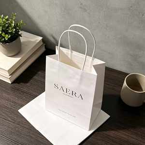 ถุงกระดาษคราฟท์สำหรับช้อปปิ้ง บรรจุภัณฑ์เสื้อผ้า ถุงกระดาษคราฟท์สีน้ำตาลสำหรับใส่ของขวัญ พร้อมโลโก้ของคุณเอง - Product Image 3