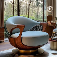 Fauteuil pivotant moderne en bois massif, revêtement en cuir, base en métal doré, adapté aux hôtels ou aux salons.