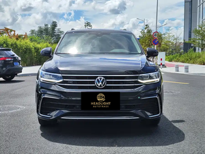 <span class=keywords><strong>Tiguan</strong></span> L SUV 2023 330TSI Automatique Traction Avant <span class=keywords><strong>R</strong></span>-<span class=keywords><strong>Line</strong></span> Essence/Hybride Rechargeable Sièges en Cuir Phares LED Véhicule d'occasion Gauche - Product Image 2