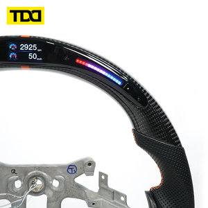 Volante Deportivo de Cuero y Fibra de Carbono con LED, Compatible con Chevrolet Corvette C6, con Marca Central Naranja y Costuras Personalizadas - Product Image 3