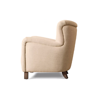 Fauteuil individuel haut de gamme pour salon, avec accoudoirs effilés, revêtement en tissu, pieds en chêne massif, idéal pour appartement et villa