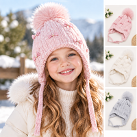Casquette Tricotée Unisexe pour Enfants, Motif Nœud et Pompon Mignons, Côtelée, Épaisse et Chaude, 100% Acrylique – Idéale pour les Cadeaux de Fêtes et les Activités en Extérieur – Nouvelle Collection en Promotion