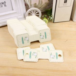 Etiquetas colgantes de papel con dibujos animados para accesorios de joyería, 200 unidades por docena, impresión personalizada en blanco con diseño de vaca linda - Product Image 1