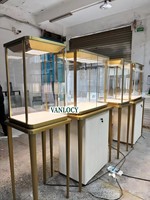 Vitrine de présentation de bijoux LED personnalisée pour magasin, comptoir en verre avec rangement, en acier inoxydable, pour centre commercial, écologique