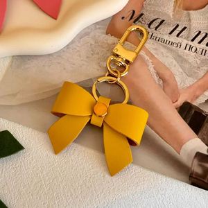 Handcrafted PU Leather Bow Keychain Purse <b>Charm</b> Bowknot Keychain Creative <b>Keyring</b> Key Holder Bag Pendant Valentines Party Favor - Product Image 2