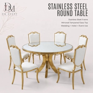 Table de salle à manger ronde de mariage personnalisée en acier inoxydable doré avec pieds arqués et plateau en verre trempé miroir - Product Image 1