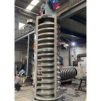Industrieller Vertikaler Spiralvibrationsförderer für Partikel, Pulver und Kekse in der Lebensmittelindustrie