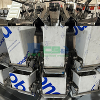 Peseuse combinée multi-têtes automatique pour granulés et poudres de détergent à flux libre
