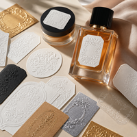 Étiquettes de parfum en métal 3D personnalisées de luxe |   Autocollants métalliques gaufrés imprimés UV pour l'emballage de flacons de parfum