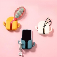 Boîte de rangement murale multifonctionnelle en plastique pour le chargement des téléphones portables Étagère pour télécommandes de téléphones portables Support pour petits objets