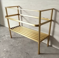 Base de vanité de salle de bains à double évier en or brossé pour dessus en marbre noir impérial pieds en acier inoxydable en laiton
