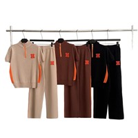 Ensemble tricoté style européen d'été : Sweat-shirt à col montant zippé brodé jacquard à manches courtes et pantalon décontracté à jambes larges