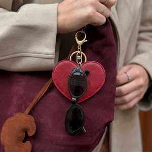 Fashion PU Leather Heart-Shaped Promotional Keychain Travel Sunglasses Clip Holder Hanging Bag Charm Portable Eyewear Storage - Product Image 1