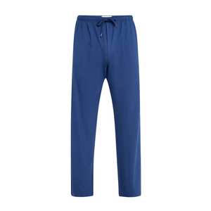 Pantalones de descanso para hombre de tejido jersey ligero con pierna ajustada y bolsillos laterales para un estilo casual elegante en casa, para correr o relajarse. - Product Image 1