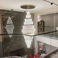 Lustre d'escalier de salle à manger Grand lustre en verre de cristal élégant moderne simple anneau lustre led éclairage à la maison