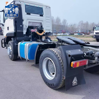 Camion tracteur diesel d'occasion 4x2 à conduite à gauche, poids lourd, haute puissance, pour transport interurbain, avec suspension pneumatique, siège et caméra arrière
