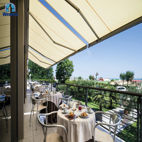 Pergola à prix de gros avec structure en alliage d'aluminium, voile en acrylique, télécommande rétractable et éclairage LED, garantie 10 ans