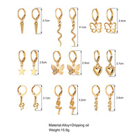 Nouvel ensemble de 9 boucles d'oreilles minimalistes de style européen en alliage plaqué or, avec étoile à cinq branches, papillon et cœur, et chaîne serpent