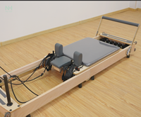 Reformer de Pilates Plegable de Roble para Estudio Comercial, Equipo de Pilates con Resistencia, OEM