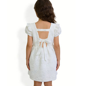 Üst Düzey Özel Tasarım ODM Parti Elbisesi Saf Beyaz Yuvarlak Yaka Sırtı Açık Fiyonklu Puf Kollu Nefes Alabilen Elbise Dokulu 3D Kumaş Geniş Etek Tatlı - Product Image 3