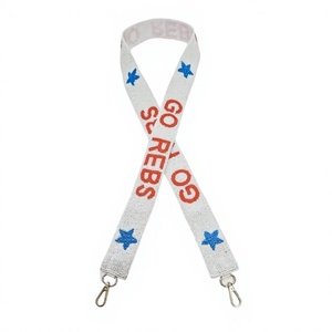 Correa de Tela con Cuentas Blancas CRYSTAL CRAFT con Estrellas Azules y Texto Rojo GO REBS, Accesorio de Moda Ecológico para Bolsos - Product Image 1