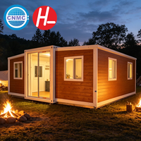 Maison conteneur en membrane d'éthylène tétrafluoroéthylène, aérogel de silice hydrophobe et nid d'abeille en aramide pour zone de villégiature écologique forestière