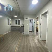 Maison modulaire isolée, résistante aux chocs et économique, extensible, préfabriquée, pour logement ou bureau.