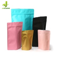 Sachet Doypack refermable personnalisé en aluminium noir mat et rose avec fermeture éclair, idéal pour l'emballage alimentaire