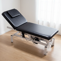 Table de massage contemporaine en cuir synthétique réglable avec éponge haute densité et cadre métallique, idéale pour chambre à coucher ou salon commercial
