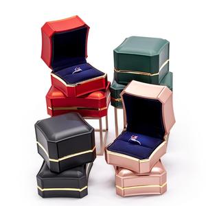 Touching Rubber Paint Metal Jewelry Packaging <b>Ring</b> Pendant Box Display With Metal Golden Rim and LED Light - Product Image 1